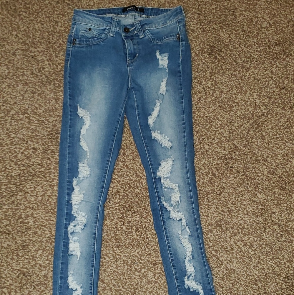 Ripped woman jeans